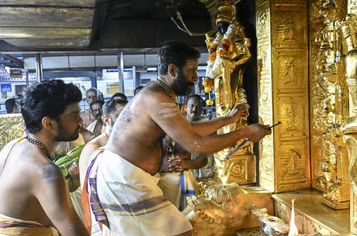 Devotees at Sabarimala during the Mandalam-Makaravilakku season.